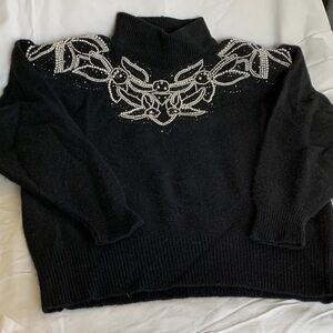 Elegant Black Turtleneck Sweater with Beaded Design